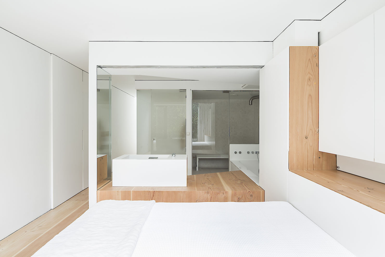GC House by inaki leite design. Fulham house lower basement bedroom from window